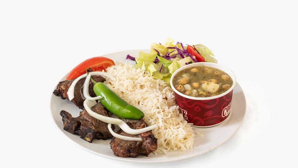 Lamb Kabob · Charbroiled boneless leg of lamb marinated in our special seasoning  served, with basmati rice , grilled vegetables , salad and bread
