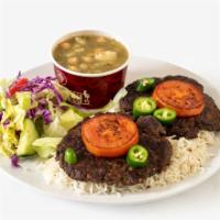 Chapli Kabob · 2 round pieces of ground beef seasoned in our special seasoning , served with basmati rice ,...