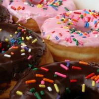 Dozen Regular Donuts · Twelve regular donuts, with selection of raised, old fashion and cake. We reserve the rights...