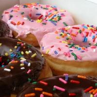 Regular Dozen Donuts · Twelve regular donuts, with selection of raised, old fashion and cake. We reserve the rights...