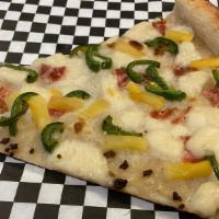 Hawaiian slice · Vegan. Our white sauce with fresh jalapeños, vegan ham, roasted pineapple, and our house mad...