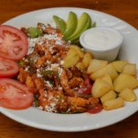 Fajita Salad · Choice of meat, bell peppers, onions, cheese, roasted potatoes, avocado, corn, and tomato sl...