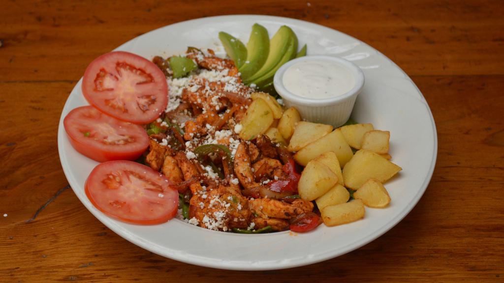 Fajita Salad · Choice of meat, bell peppers, onions, cheese, roasted potatoes, avocado, corn, and tomato slices.