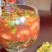 Coctel De Camaron Y Pulpo · Shrimp, octopus, lime, onion, cilantro, tomato, and avocado.