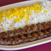Beef Koobideh · Two skewers of freshly ground beef tenderloin charbroiled to perfection with a BBQ Tomato.