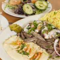 Beef+Lamb Shawarma Plate · Thinly sliced Shawerma .  Cooked on our specialized upright rotisserie .   Served with rice,...