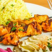 Shish Kabob Chicken Plate · Boneless chicken breast skewered & grilled.   Served with rice, salad, hummus , pita bread a...