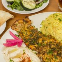 Chicken Fillet Plate · Tender fillet of boneless chicken thigh , marinated and  grilled . Served with rice, hummus,...
