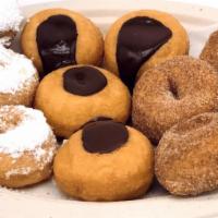 Build Your own Flight dozen · a dozen flight mini doughnuts choose up to 3 flavors