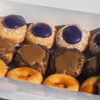 #2 Flight Dozen · a dozen flight mini doughnuts with 3 different flavors:
ube coconut, oreo cookies w/cookie b...
