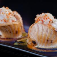 Honeymoon Special  (1.2.) · Chopped spicy scallop, dungeness crab & tobiko seasoned with spicy aioli placed over rice & ...