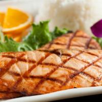 Salmon Teriyaki  (1.2.) · Charbroiled & drizzled with teriyaki sauce served with rice, salad & miso soup.