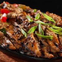 Chicken Bulgogi · Grilled marinated chicken over sauteed mushrooms, bell peppers, topped with green onions & s...