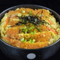 Pork Donburi  (1.2.) · Japanese Rice Bowl with pork cutlet and egg.