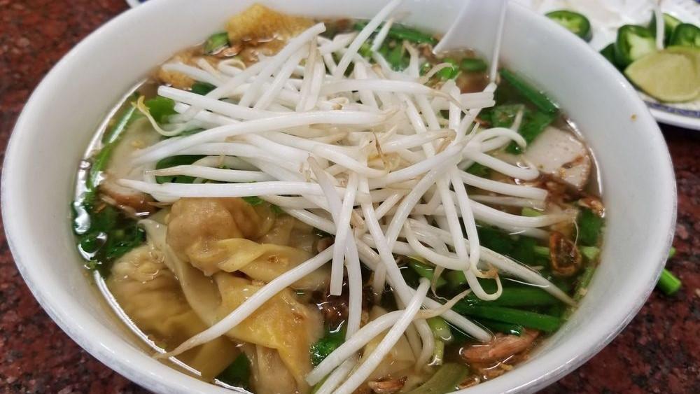 9. Wonton Rice Noodle Soup · Wonton soup with choice of chicken or beef broth.