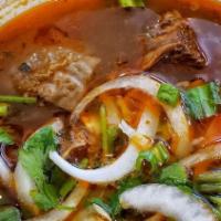 39. Mi Bo Kho · Beef stew with egg noodle.