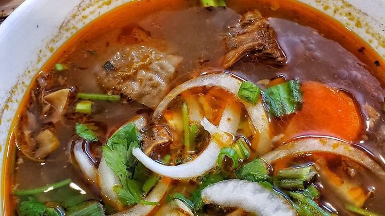 39. Mi Bo Kho · Beef stew with egg noodle.