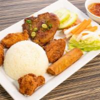 55. Combo Plate · Grilled pork chop, 2 fried chicken wings and egg roll with steamed rice.