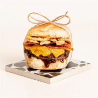 BBQ Burger Slider · Juicy beef patty with melted cheddar cheese, bbq sauce, crispy bacon, and fried onion string...