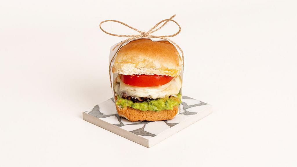 Southwest Slider · Juicy beef patty with pepper jack cheese, tomato, and guacamole on a toasted bun.