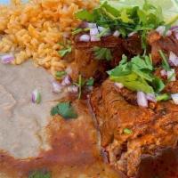 Plato de Birria · Plate of Mexican Style Braised Beef. Served with Mexican Rice, Bacon Refried Beans, and Thre...