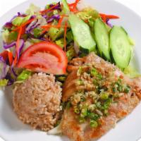 Healthy Garlic Fish · A Mouthwatering Fish Filet Seasoned with Garlic. Served with Brown Rice and Tossed Green Sal...