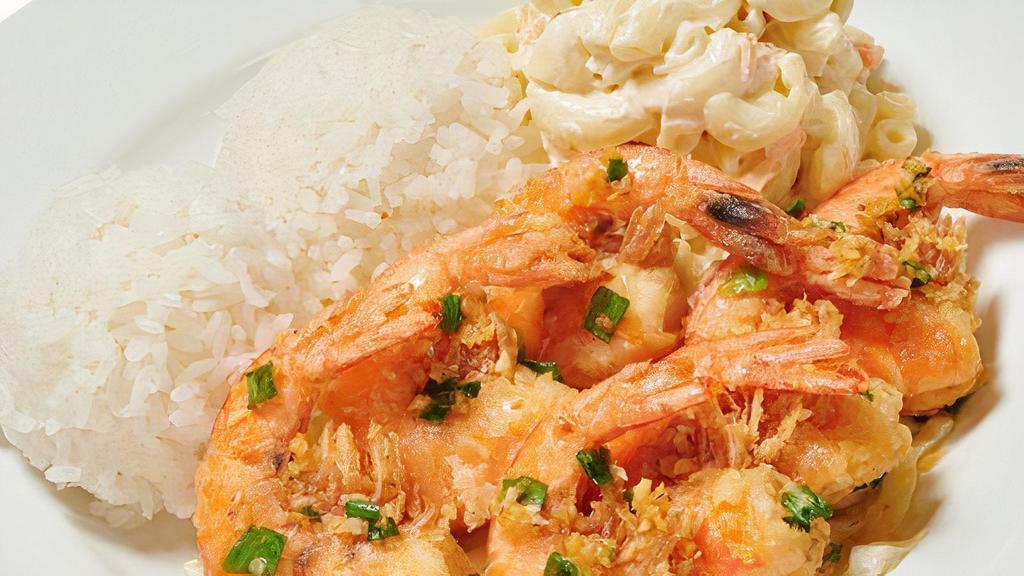 Garlic Shrimp · Succulent Shrimp Sautéed in Garlic Butter. Served with White Rice and Choice of Macaroni Salad or Tossed Green Salad.
