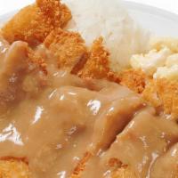 Chicken Cutlet With Gravy · Crispy breaded chicken topped with our special brown gravy.