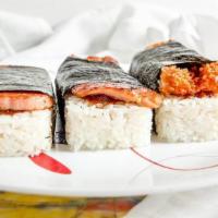Chicken Katsu Musubi · Chicken Katsu with a Scoop of White Rice Topped with our Special L&L BBQ Sauce and Wrapped w...