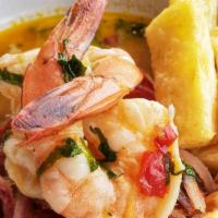 Hot Stone Shrimp Ceviche · Shrimps cooked with Peruvian yellow pepper paste, garlic, onions, and lemon juice. Served wi...