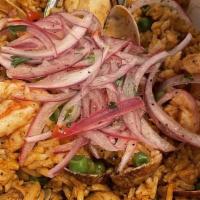 Paella Peruana · Gluten-Free. Fresh seafood cooked a hot pan with fish broth, rice, Peruvian pepper, bell pep...
