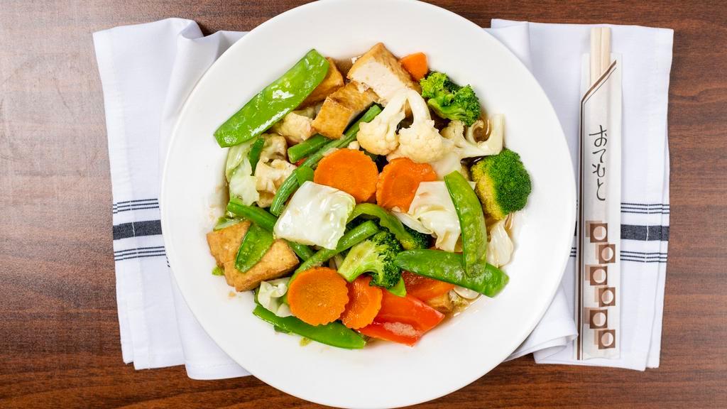 29. Fried Vegetables · Broccoli, snow peas, cabbage, cauliflower, carrot, mushroom, green bean, and soft tofu cook with house special sauce.