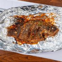 42. Grilled Fish Spicy or Non Spicy · Frilled tilapia fish coated with house special sauce - garlic, chilli, cilantro,