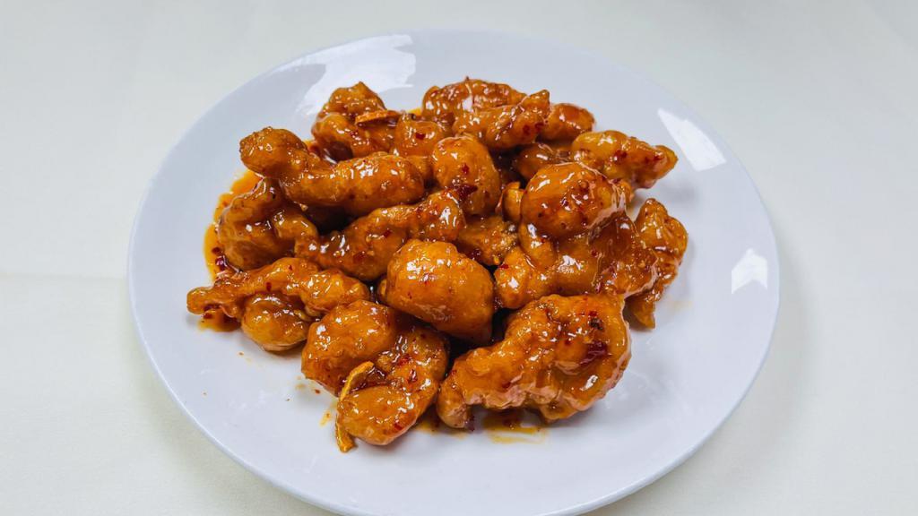 Orange Chicken · Hot and spicy. Deep fried chicken with orange peel in our sweet and spicy sauce.