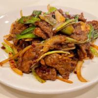 Mongolian Beef · Hot and spicy. Sliced beef with onion, green onion in hot garlic sauce.