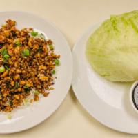 Chicken in Lettuce Cups · Minced chicken, water chestnuts, bamboo shoot, mushroom and onion in oyster sauce.