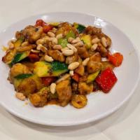 Kung Pao Chicken · Hot and spicy. Diced chicken with mushroom, zucchini, water chestnut, bell pepper, red bell ...