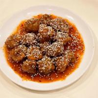 Sesame Chicken · Hot and spicy. Deep fried chicken with sesame in our sweet and spicy sauce.