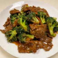 Beef w/ Broccoli · Sliced beef with broccoli, carrot in garlic sauce.