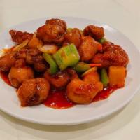 Sweet & Sour Pork · Deep fried pork with bell pepper, onion, carrot, pineapple in sweet and sour sauce.