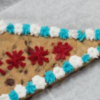 Cookie Cake Slice · A slice of our delicious chocolate chip cookie cake with icing.
