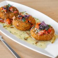 Crab Cakes (3) · with lemon butter sauce