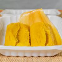 2 PIECE  PINEAPPLE & COCONUT SWEET  TAMALE · Delicious sweet batter corn masa mix with coconut and pineapple. Wrapped in corn  husks.(Veg...