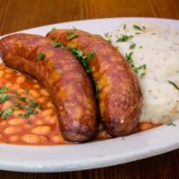 Irish Bangers and Mash · Two large juicy banger sausages with mashed potatoes, baked beans & gravy.