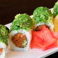 Poki Tuna Roll · Spicy tuna roll, wakame (seaweed salad).