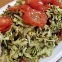 A5. Tea Leaf Salad · Fermented tea leaf, cabbage, tomato, chilli, dried shrimp, peanut, yellow bean, and sesame s...