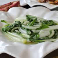 Chinese Little Greens 雞毛菜 · Similar to bok choy, our Chinese little greens are cooked in a hot wok that gives it a nice ...