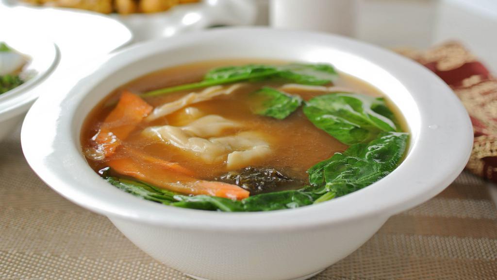 Wonton Soup 雲吞湯 · With  house made pork and cabbage wontons.