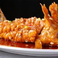 Mandarin Fish 松鼠鱼 · Fried, boneless whole fish in our house made sweet and sour sauce.