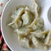 Pork Dumplings (12 Pc) 白菜豬肉水餃 · With napa cabbage and pork filling.